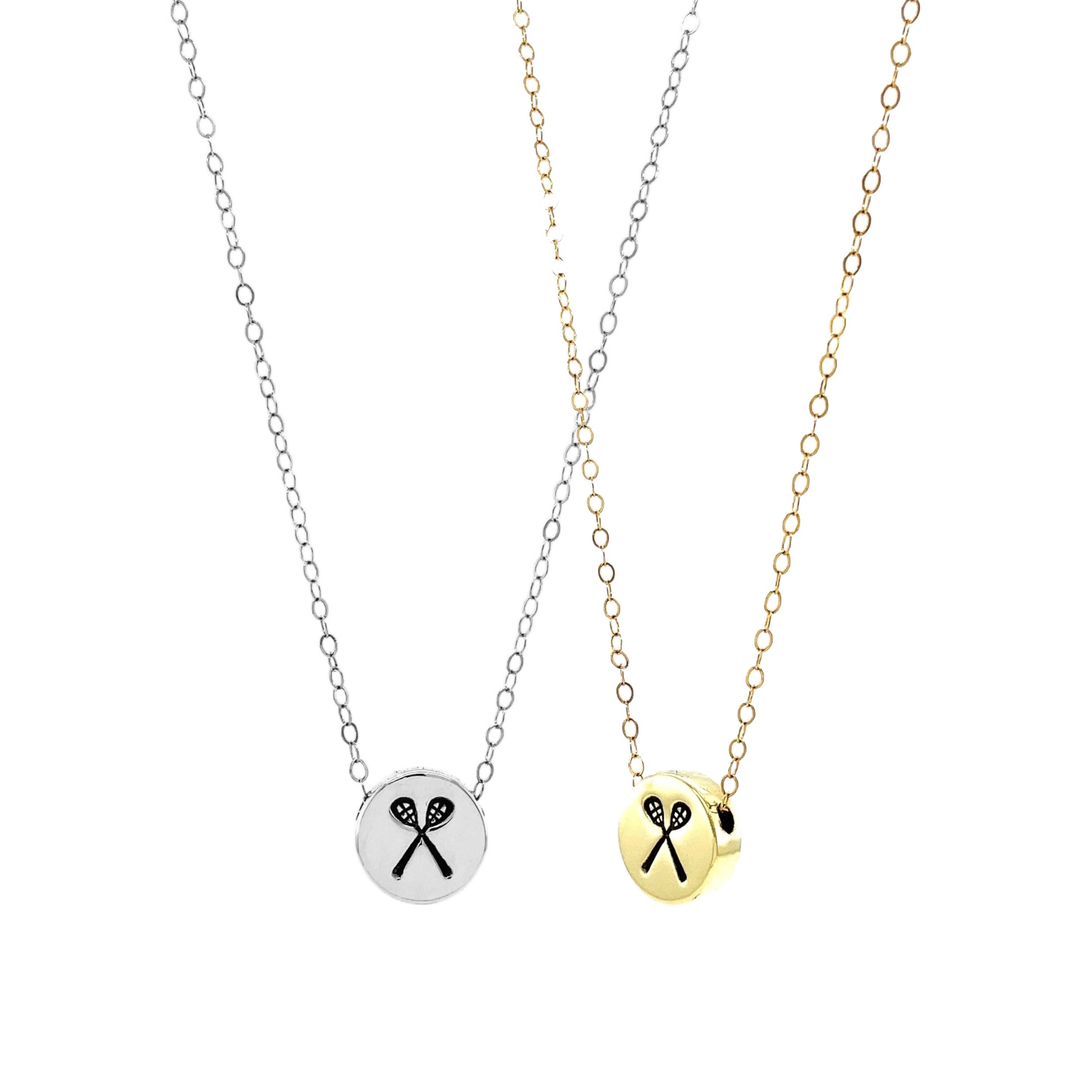 Each lacrosse stick charm is individually hand-forged, adding a personal, artisanal touch to your sports jewelry collection. This necklace features a lacrosse stick sliding charm that sits perfectly on the chain, offering a sleek, sporty look.